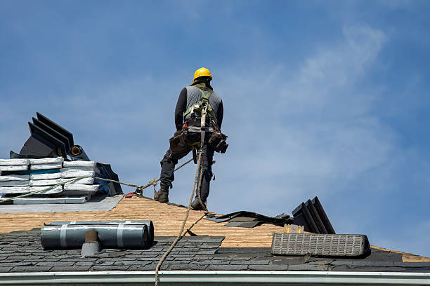 Professional Roof Replacement technician working in Spray, OR